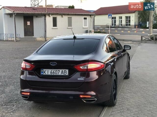 Червоний Форд Фьюжен, об'ємом двигуна 1.6 л та пробігом 222 тис. км за 7999 $, фото 6 на Automoto.ua