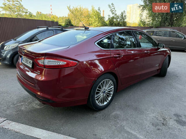 Червоний Форд Фьюжен, об'ємом двигуна 2 л та пробігом 238 тис. км за 8900 $, фото 3 на Automoto.ua