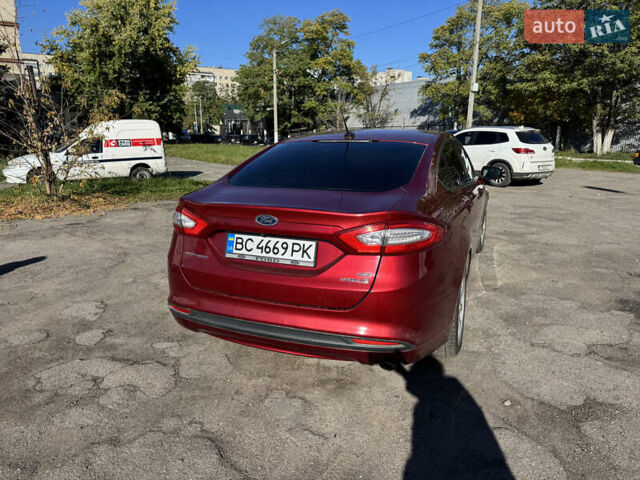 Форд Фьюжн 2013 в Львове на Automoto.ua Красный Форд Фьюжн, объемом двигателя 2 л и пробегом 221 тыс. км за 12500 $, фото 8 на Automoto.ua