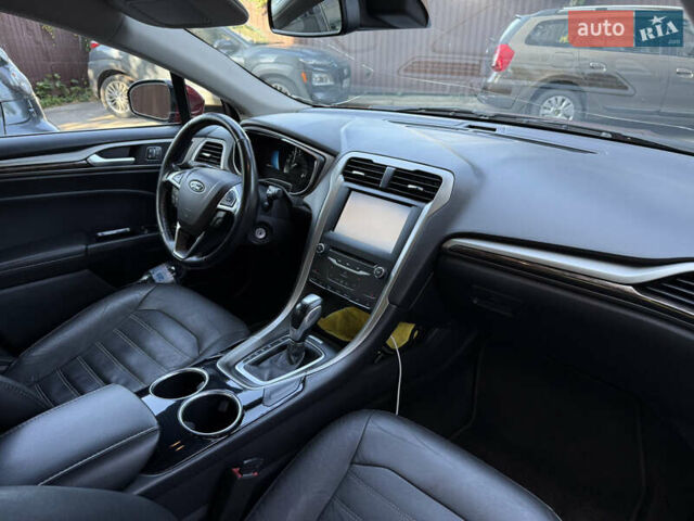Червоний Форд Фьюжен, об'ємом двигуна 2 л та пробігом 238 тис. км за 8900 $, фото 4 на Automoto.ua