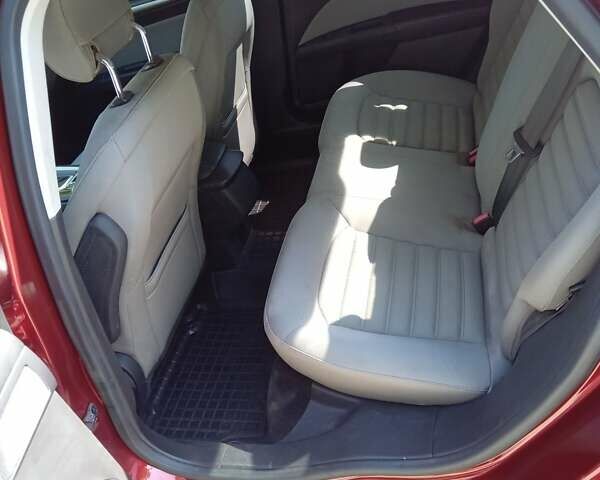 Красный Форд Фьюжн, объемом двигателя 2.4 л и пробегом 103 тыс. км за 9900 $, фото 2 на Automoto.ua