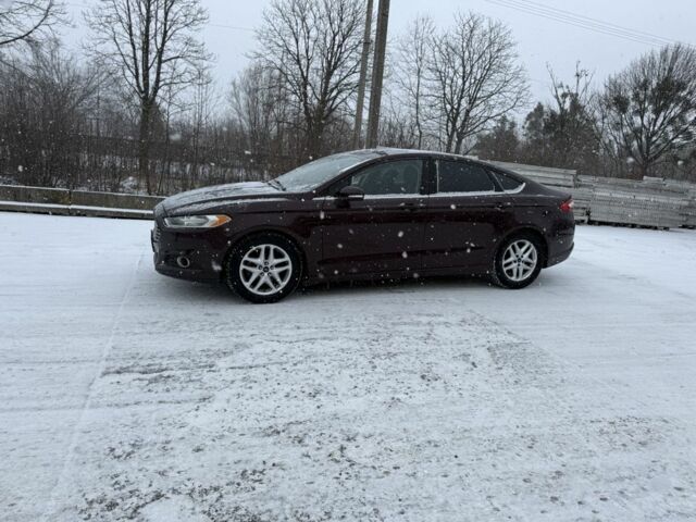 Червоний Форд Фьюжен, об'ємом двигуна 1.6 л та пробігом 240 тис. км за 5900 $, фото 1 на Automoto.ua