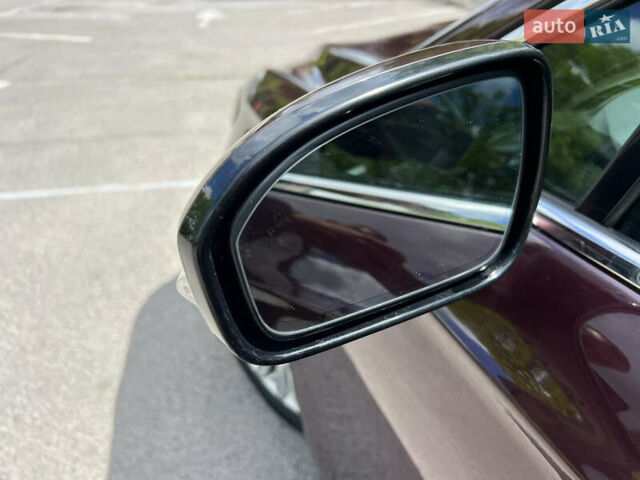 Красный Форд Фьюжн, объемом двигателя 2 л и пробегом 155 тыс. км за 12999 $, фото 9 на Automoto.ua