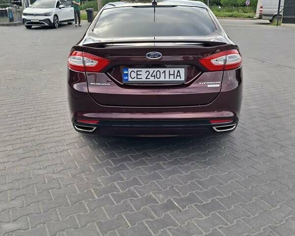 Красный Форд Фьюжн, объемом двигателя 2 л и пробегом 161 тыс. км за 10999 $, фото 5 на Automoto.ua