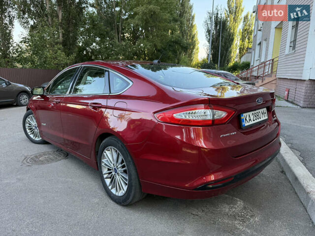 Червоний Форд Фьюжен, об'ємом двигуна 2 л та пробігом 238 тис. км за 8900 $, фото 2 на Automoto.ua