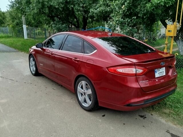 Червоний Форд Фьюжен, об'ємом двигуна 2 л та пробігом 258 тис. км за 11999 $, фото 6 на Automoto.ua