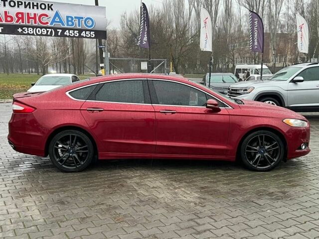 Красный Форд Фьюжн, объемом двигателя 2 л и пробегом 135 тыс. км за 9500 $, фото 7 на Automoto.ua