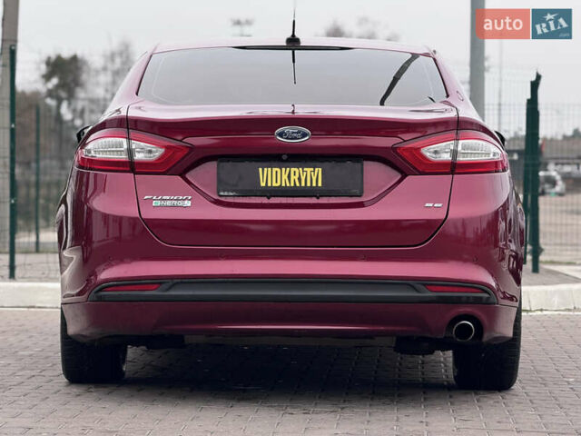 Красный Форд Фьюжн, объемом двигателя 2 л и пробегом 210 тыс. км за 10500 $, фото 12 на Automoto.ua