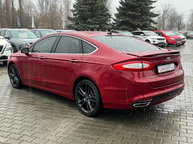 Красный Форд Фьюжн, объемом двигателя 2 л и пробегом 135 тыс. км за 9500 $, фото 4 на Automoto.ua