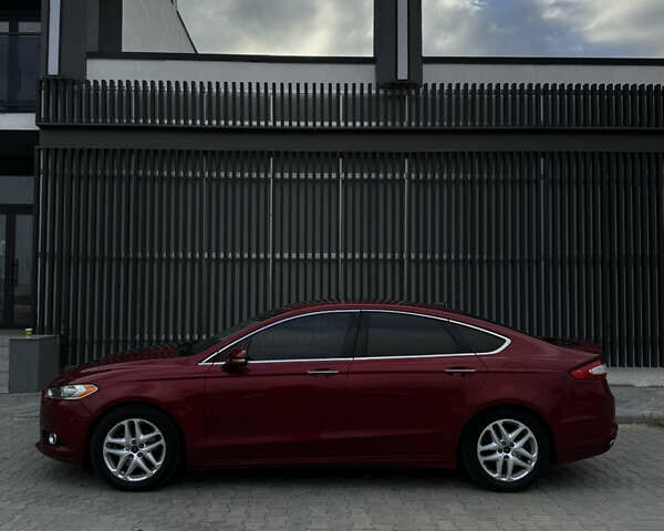 Червоний Форд Фьюжен, об'ємом двигуна 2 л та пробігом 236 тис. км за 10800 $, фото 1 на Automoto.ua