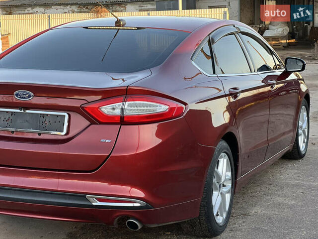 Червоний Форд Фьюжен, об'ємом двигуна 2.5 л та пробігом 145 тис. км за 9500 $, фото 6 на Automoto.ua