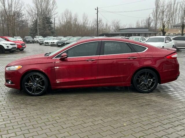 Красный Форд Фьюжн, объемом двигателя 2 л и пробегом 135 тыс. км за 9500 $, фото 3 на Automoto.ua