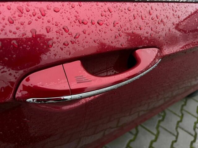 Красный Форд Фьюжн, объемом двигателя 2 л и пробегом 135 тыс. км за 9500 $, фото 8 на Automoto.ua