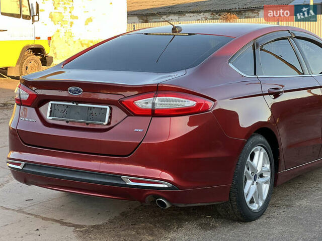 Червоний Форд Фьюжен, об'ємом двигуна 2.5 л та пробігом 145 тис. км за 9500 $, фото 5 на Automoto.ua