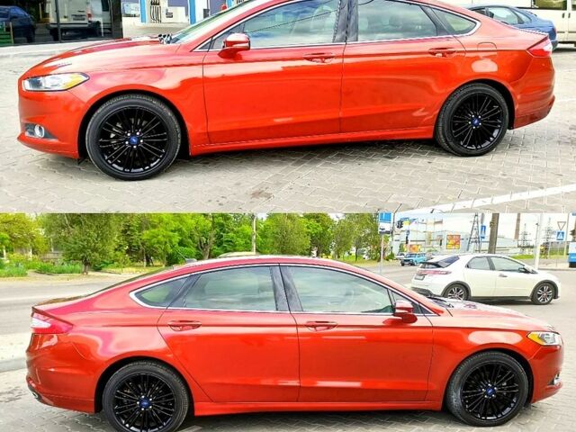 Красный Форд Фьюжн, объемом двигателя 2 л и пробегом 215 тыс. км за 9500 $, фото 10 на Automoto.ua