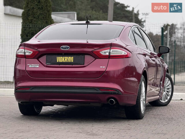 Красный Форд Фьюжн, объемом двигателя 2 л и пробегом 210 тыс. км за 10500 $, фото 13 на Automoto.ua