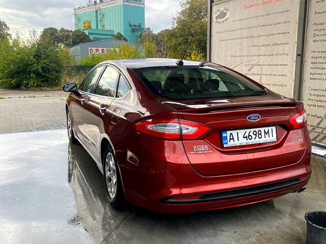 Форд Фьюжен 2014 у Києві на Automoto.ua Червоний Форд Фьюжен, об'ємом двигуна 25 л та пробігом 128 тис. км за 9300 $, фото 4 на Automoto.ua
