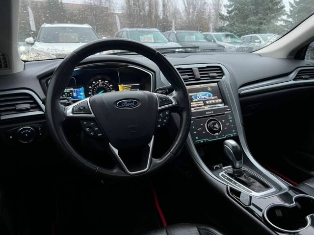 Красный Форд Фьюжн, объемом двигателя 2 л и пробегом 135 тыс. км за 9500 $, фото 13 на Automoto.ua