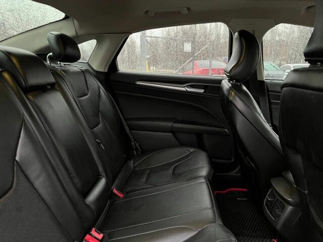 Красный Форд Фьюжн, объемом двигателя 2 л и пробегом 135 тыс. км за 9500 $, фото 20 на Automoto.ua