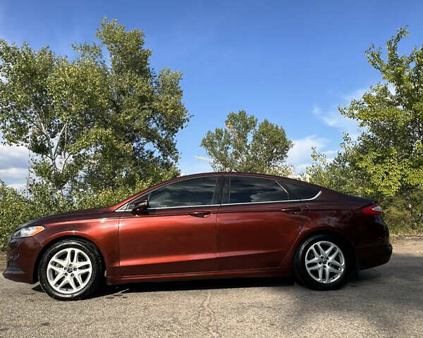 Красный Форд Фьюжн, объемом двигателя 1.5 л и пробегом 130 тыс. км за 8600 $, фото 6 на Automoto.ua