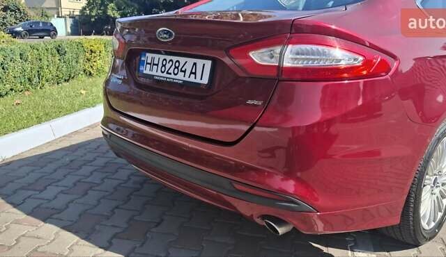 Червоний Форд Фьюжен, об'ємом двигуна 2 л та пробігом 186 тис. км за 11900 $, фото 2 на Automoto.ua