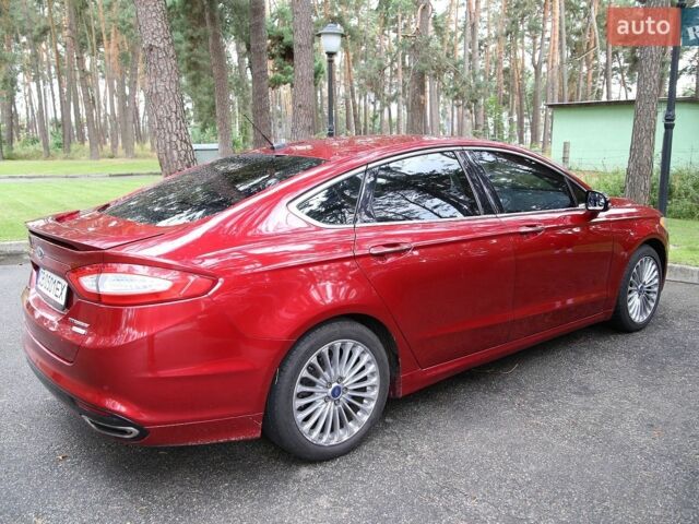 Червоний Форд Фьюжен, об'ємом двигуна 2 л та пробігом 167 тис. км за 10400 $, фото 1 на Automoto.ua