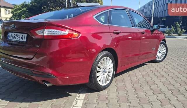 Червоний Форд Фьюжен, об'ємом двигуна 2 л та пробігом 186 тис. км за 11900 $, фото 1 на Automoto.ua