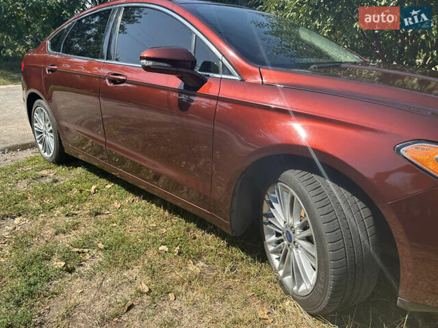 Червоний Форд Фьюжен, об'ємом двигуна 2 л та пробігом 140 тис. км за 11200 $, фото 18 на Automoto.ua