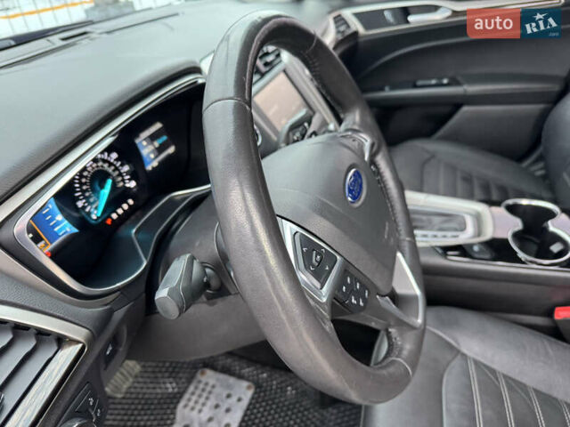 Червоний Форд Фьюжен, об'ємом двигуна 2 л та пробігом 144 тис. км за 10990 $, фото 12 на Automoto.ua