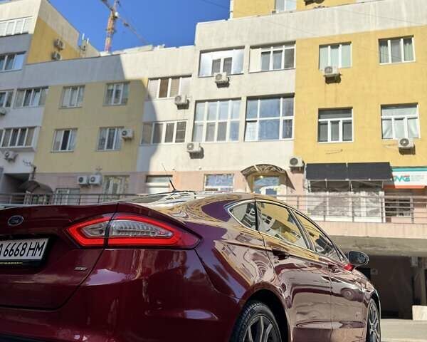Червоний Форд Фьюжен, об'ємом двигуна 2 л та пробігом 192 тис. км за 14000 $, фото 3 на Automoto.ua