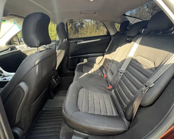 Красный Форд Фьюжн, объемом двигателя 1.5 л и пробегом 130 тыс. км за 8600 $, фото 11 на Automoto.ua