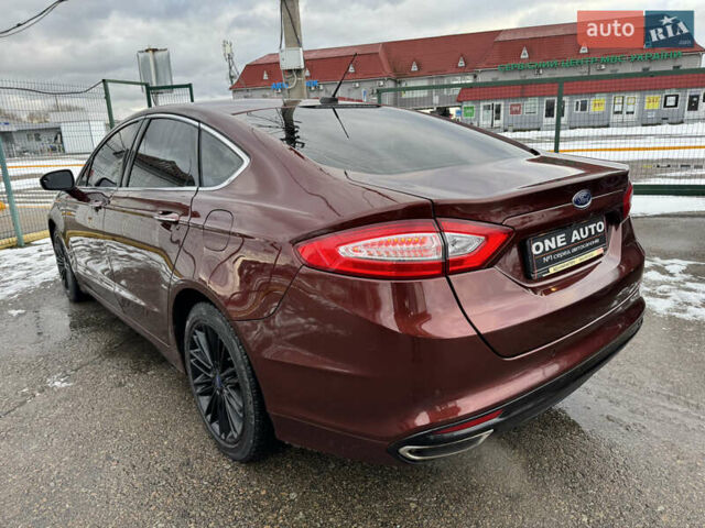 Червоний Форд Фьюжен, об'ємом двигуна 2 л та пробігом 144 тис. км за 10990 $, фото 6 на Automoto.ua