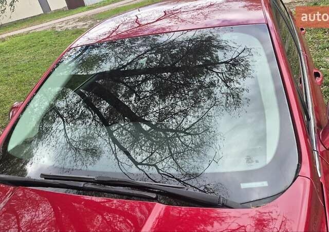 Красный Форд Фьюжн, объемом двигателя 2.49 л и пробегом 214 тыс. км за 9300 $, фото 4 на Automoto.ua