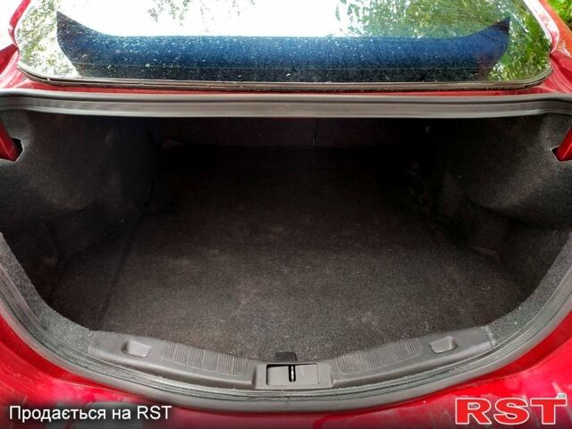 Красный Форд Фьюжн, объемом двигателя 2.5 л и пробегом 179 тыс. км за 10777 $, фото 4 на Automoto.ua