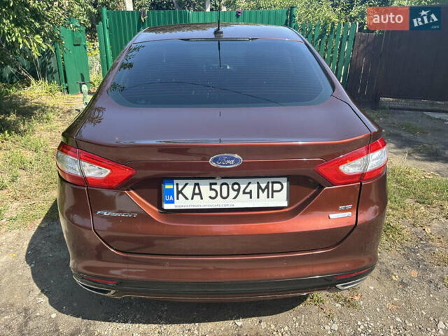 Червоний Форд Фьюжен, об'ємом двигуна 2 л та пробігом 140 тис. км за 11200 $, фото 20 на Automoto.ua