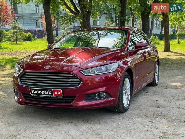 Червоний Форд Фьюжен, об'ємом двигуна 2 л та пробігом 187 тис. км за 12790 $, фото 1 на Automoto.ua