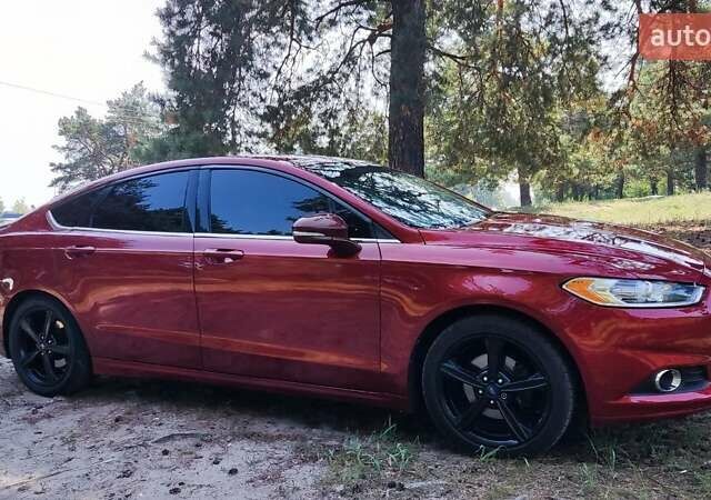 Красный Форд Фьюжн, объемом двигателя 2 л и пробегом 163 тыс. км за 12500 $, фото 11 на Automoto.ua