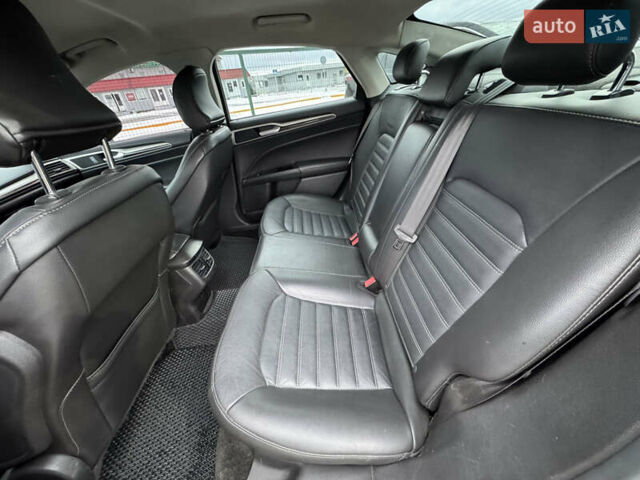 Червоний Форд Фьюжен, об'ємом двигуна 2 л та пробігом 144 тис. км за 10990 $, фото 22 на Automoto.ua