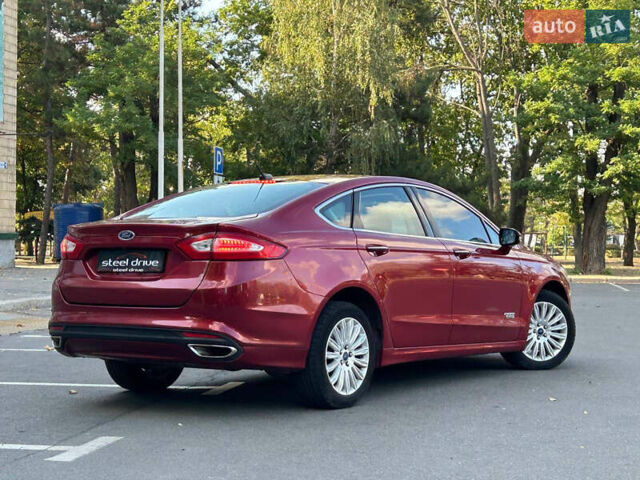 Красный Форд Фьюжн, объемом двигателя 2 л и пробегом 186 тыс. км за 13499 $, фото 2 на Automoto.ua