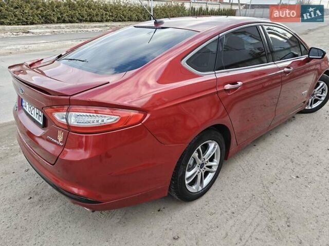 Красный Форд Фьюжн, объемом двигателя 2 л и пробегом 183 тыс. км за 13500 $, фото 9 на Automoto.ua