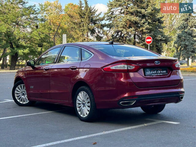Красный Форд Фьюжн, объемом двигателя 2 л и пробегом 186 тыс. км за 13499 $, фото 3 на Automoto.ua