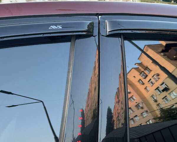 Красный Форд Фьюжн, объемом двигателя 2 л и пробегом 190 тыс. км за 11850 $, фото 3 на Automoto.ua