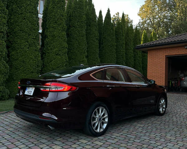 Красный Форд Фьюжн, объемом двигателя 2 л и пробегом 211 тыс. км за 13999 $, фото 2 на Automoto.ua