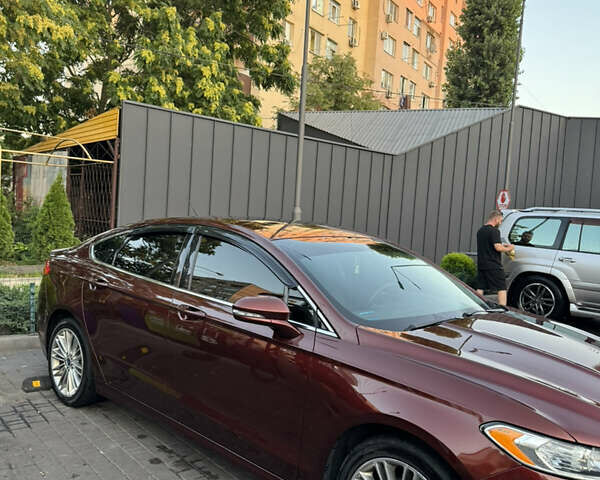 Красный Форд Фьюжн, объемом двигателя 2 л и пробегом 190 тыс. км за 11850 $, фото 6 на Automoto.ua