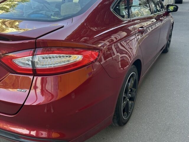 Красный Форд Фьюжн, объемом двигателя 2.5 л и пробегом 125 тыс. км за 10800 $, фото 4 на Automoto.ua