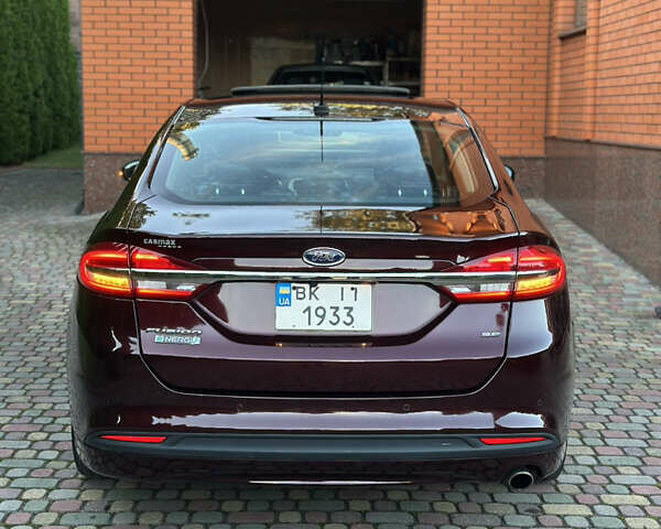 Красный Форд Фьюжн, объемом двигателя 2 л и пробегом 211 тыс. км за 12999 $, фото 5 на Automoto.ua