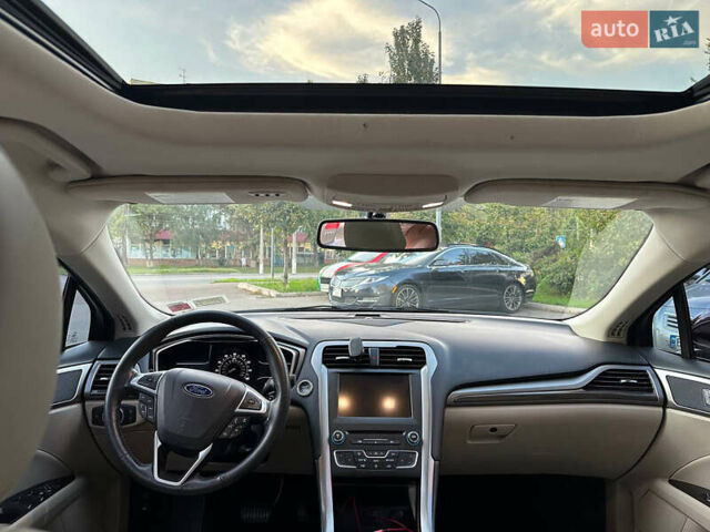 Красный Форд Фьюжн, объемом двигателя 2 л и пробегом 133 тыс. км за 17500 $, фото 14 на Automoto.ua