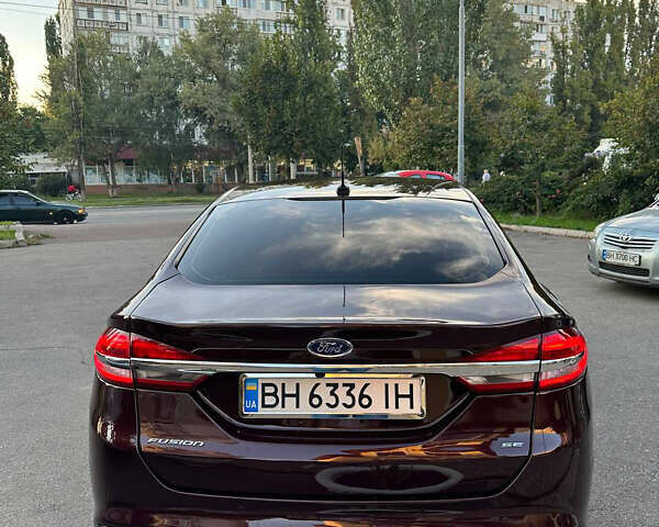 Красный Форд Фьюжн, объемом двигателя 2 л и пробегом 133 тыс. км за 17500 $, фото 7 на Automoto.ua