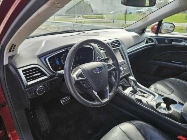 Красный Форд Фьюжн, объемом двигателя 2 л и пробегом 78 тыс. км за 9000 $, фото 6 на Automoto.ua