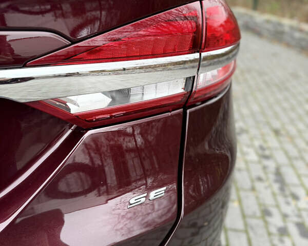 Красный Форд Фьюжн, объемом двигателя 2 л и пробегом 107 тыс. км за 13700 $, фото 10 на Automoto.ua